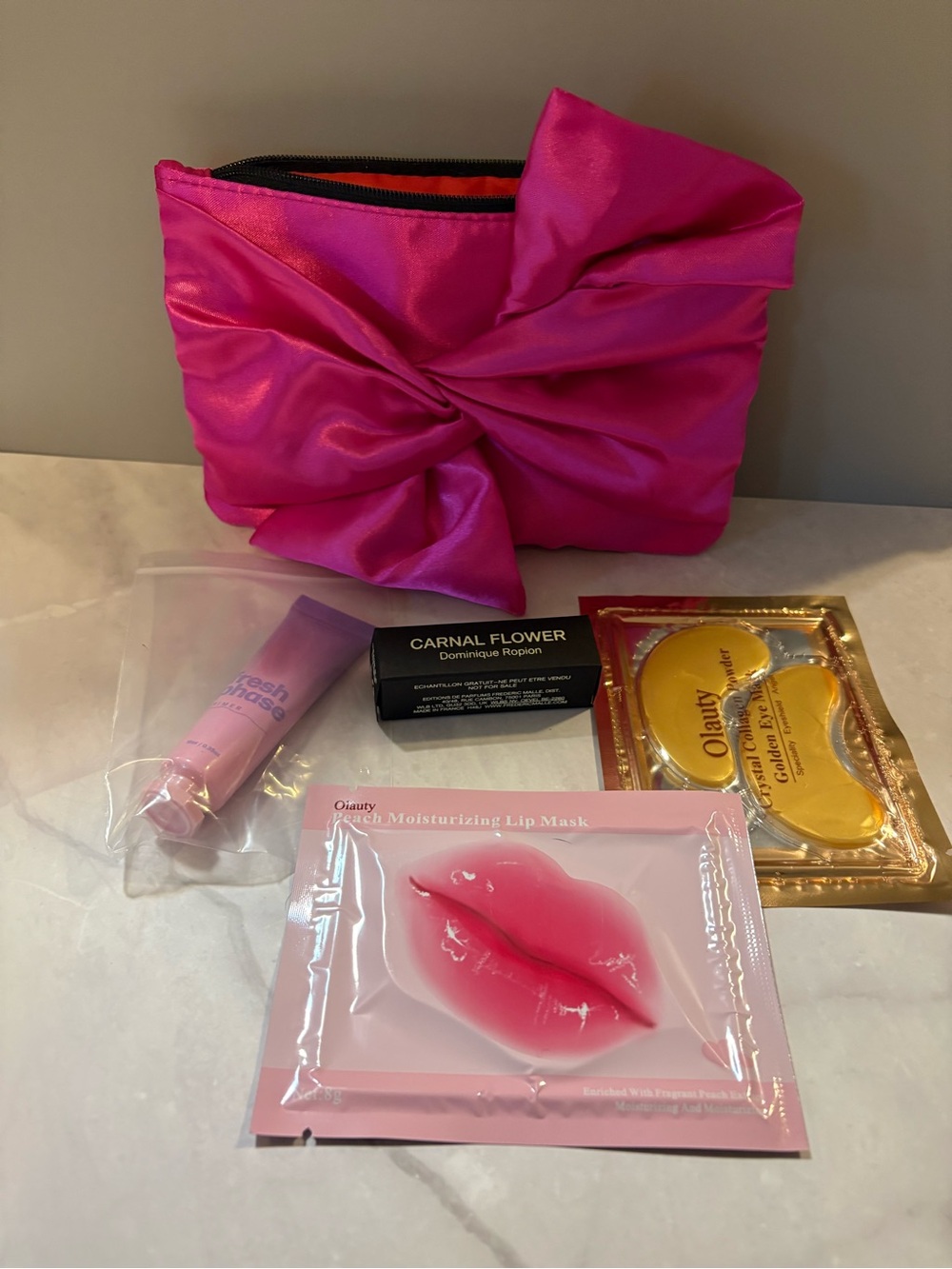 Source Unknown Hot Pink Satin Cosmetic Pouch with Lip Masks & Gold Eye Patches